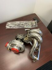 T04E T3/T4 .63 A/R Turbo & Manifold T3 Center Mount for 2.3L Ford Mustang SVO picture