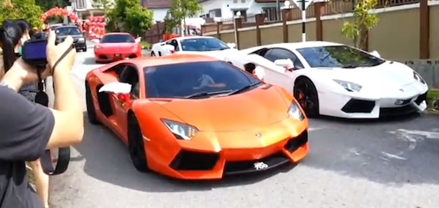 Malaysian athletes tie the knot with a parade of supercars